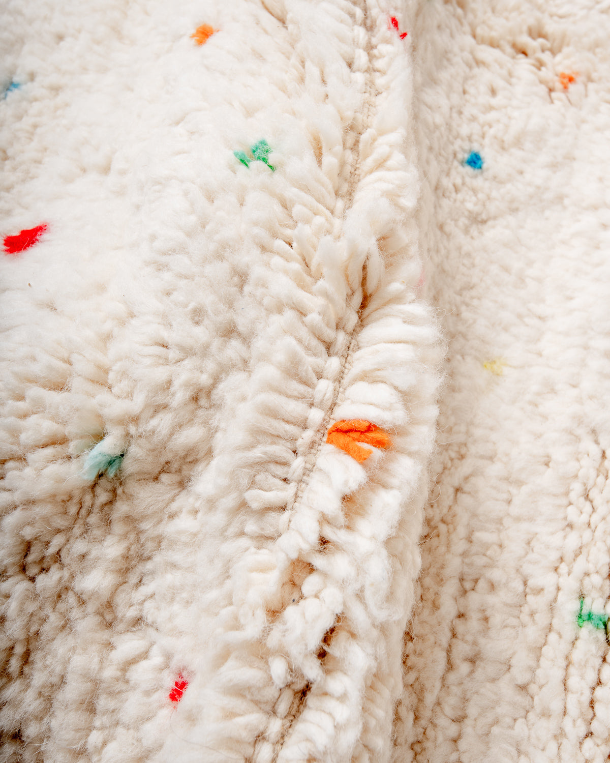 Modern, designer, handcrafted Berber rug from Morocco. Beniourain carpet with beautiful colours and patterns and fluffy wool texture.
